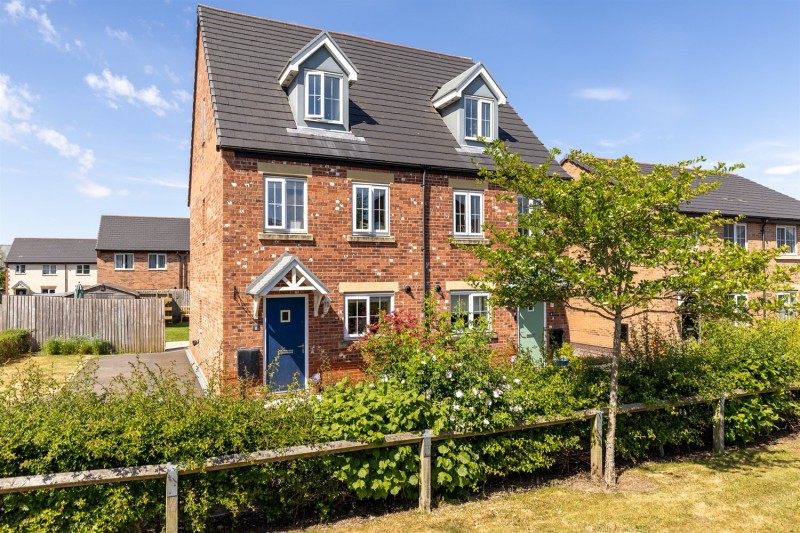 Modern three storey home with landscaped garden